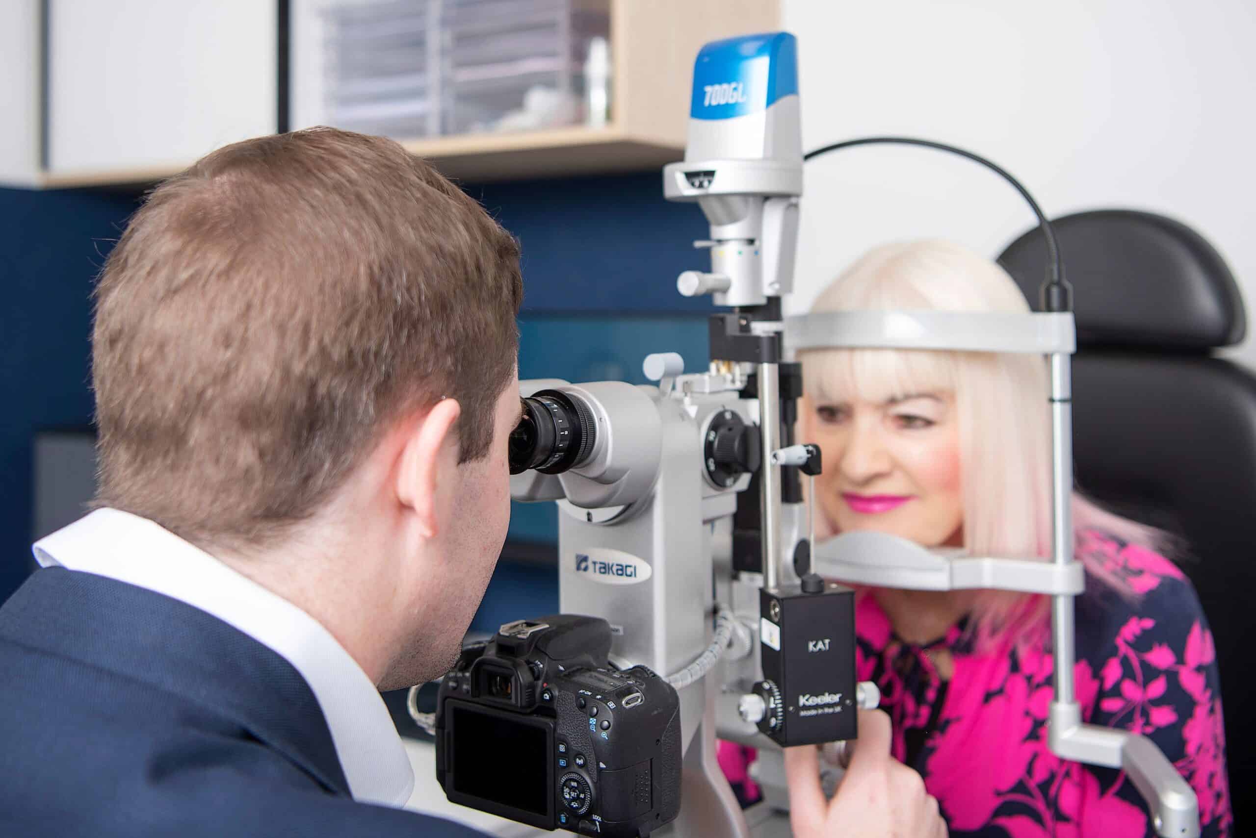 Dr Ryan checking a patients eyes